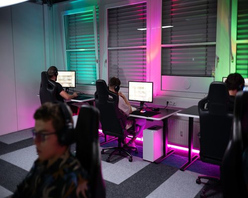 ArcticPulseFi team working in modern office Finland gaming technology company